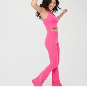 Two VG size medium long length OFFLINE Aerie Real Me Flare twist front leggings